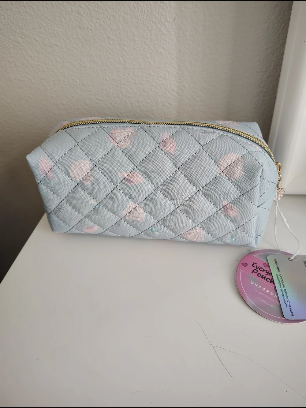 Under One Sky Quilted Cosmetic Pouch in Pale Blue with Light Pink Shells